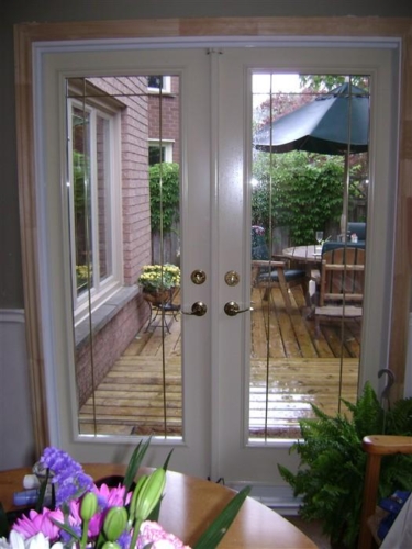 French Door With Brass Prairie Grills